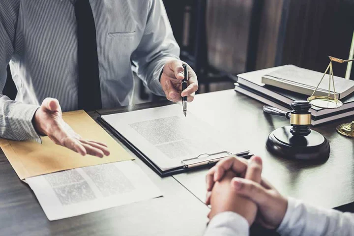 sitting down with a lawyer understanding closing costs for sellers