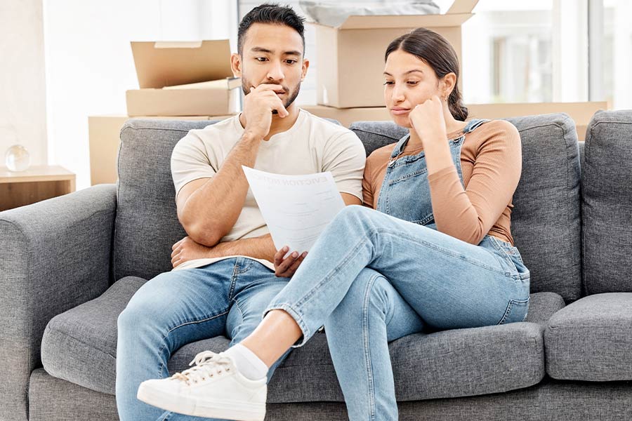 couple reviewing their Rights During Foreclosure