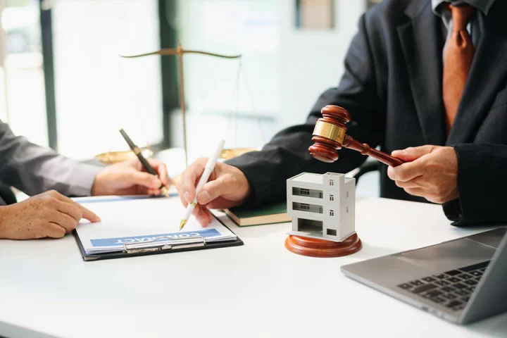 man sitting with judge ansering the question can you sell an inherited house in probate